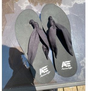 Black AE flip flops